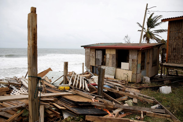 Damaged houses are seen after the area was hit by Hurricane Maria in Yabucoa, Puerto Rico September 22, 2017. REUTERS/Carlos Garcia Rawlins