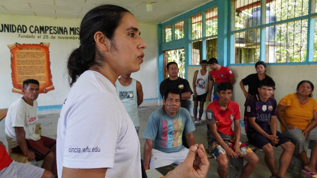 Claudia Vega, Mercury Coordinator for CINCIA, explains the dangers of illegal mining in the community hall in Mishana, on the Nanay RIver, Loreto, Peru, August 18, 2024. Thomson Reuters Foundation/Dan Collyns