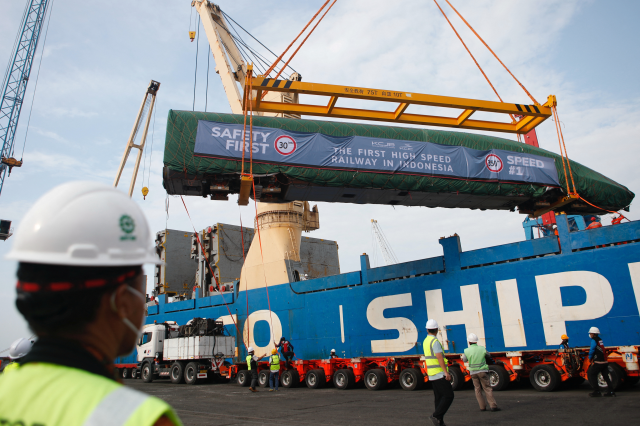 An Electric Multiple Unit high-speed train for a rail link project, which is part of China’s Belt and Road Initiative, arrives at Tanjung Priok port during load in Jakarta, Indonesia, September 2, 2022. REUTERS/Ajeng Dinar Ulfiana