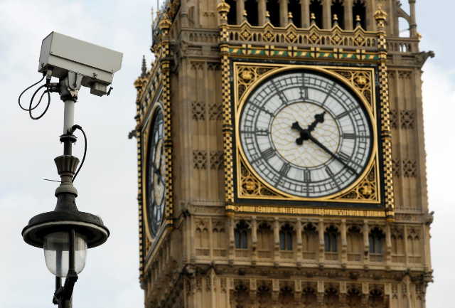 A surveillance camera points towards Parliament Square, in front of the Big Ben Clock Tower in London October 18, 2010
