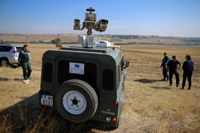 Dutch and Bulgarian border police officers stand near a vehicle equipped with a thermal camera during a patrol a day after the official launch of the European Union's Border and Coast Guard Agency near Kapitan Andreevo border crossing on the Bulgarian-Turkish border, Bulgaria October 7, 2016. REUTERS/Stoyan Nenov