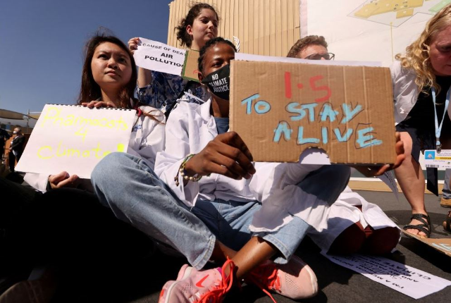 Activists protest at the Sharm El-Sheikh International Convention Centre, during the COP27 climate summit, in Sharm el-Sheikh, Egypt, 
November 11, 2022