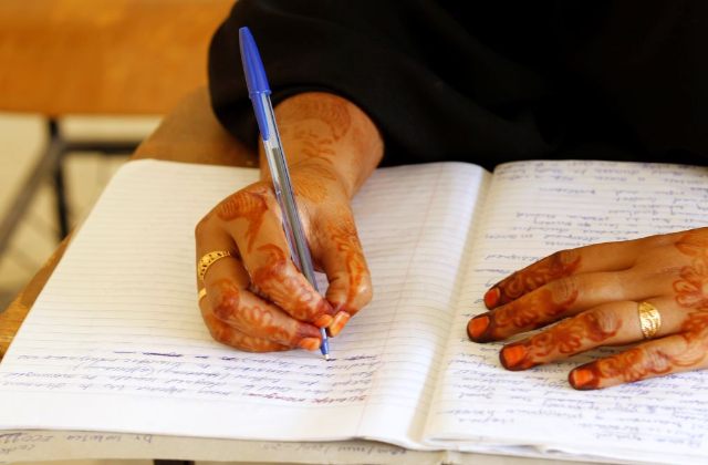 A third-year student at the Garissa University College, studies in a lecture hall in Kenya's northeast town of Garissa, January 11, 2016