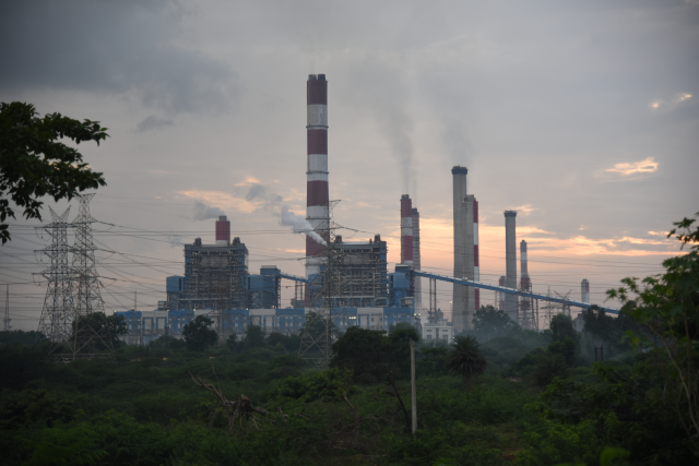 Smoke coming out of chimneys of NTPC Vindhyachal coal power plant, the largest in India. Singrauli, India, on August 28, 2024. Thomson Reuters Foundation/Tanmoy Bhaduri