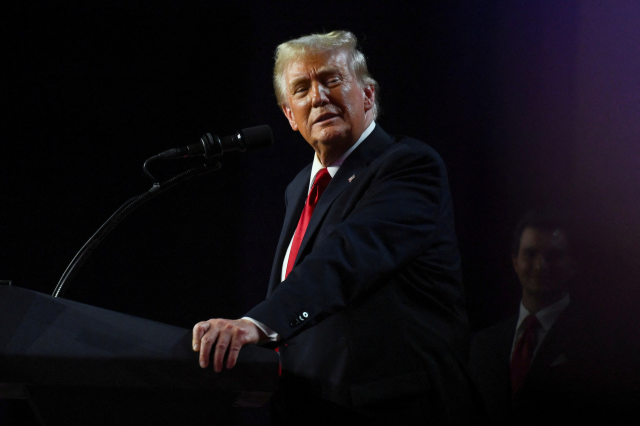Republican presidential nominee and former U.S. President Donald Trump takes the stage following early results from the 2024 U.S. presidential election in Palm Beach County Convention Center, in West Palm Beach, Florida, U.S., November 6, 2024. REUTERS/Callaghan O'Hare