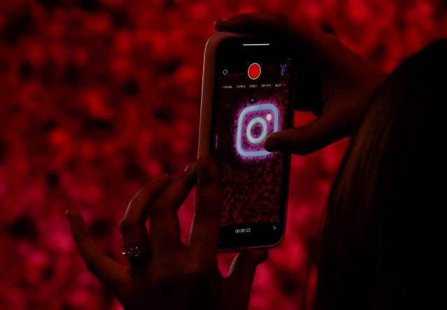 A logo of mobile application Instagram is seen on a mobile phone, during a conference in Mumbai, India, September 20, 2023. REUTERS/Francis Mascarenhas
