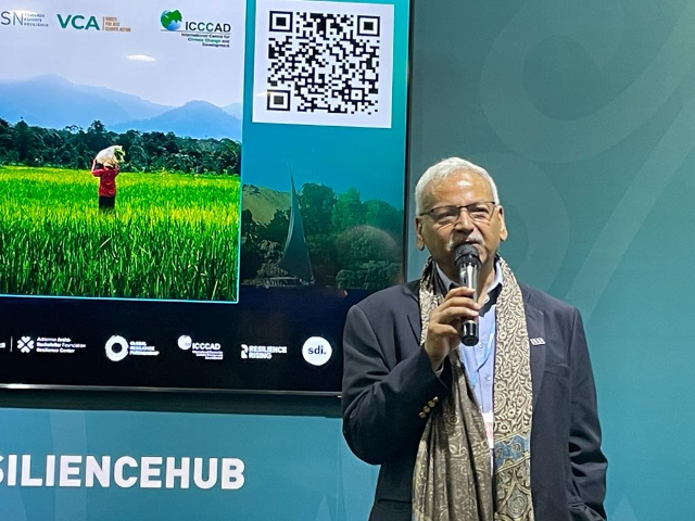 Bangladeshi adaptation expert Professor Saleemul Huq speaks at The Resilience Hub at the COP27 U.N. climate talks in Sharm el-Sheikh, Egypt in this undated photograph. Laurie Goering/Thomson Reuters Foundation