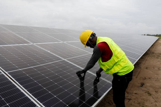 A technician works on solar power panels at the Atlantic Shrimpers farm in Badagry, Lagos, Nigeria July 5, 2022. REUTERS/Temilade Adelaja