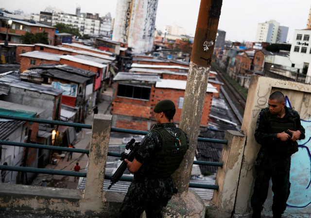 Military police patrol at the Moinho Favela in Sao Paulo, Brazil, June 28, 2017. REUTERS/Nacho Doce
